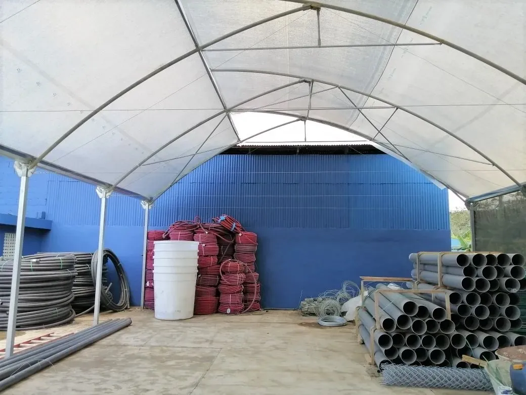 Greenhouse supplies stocked under cover at MSC's distribution centre in the Dominican Republic